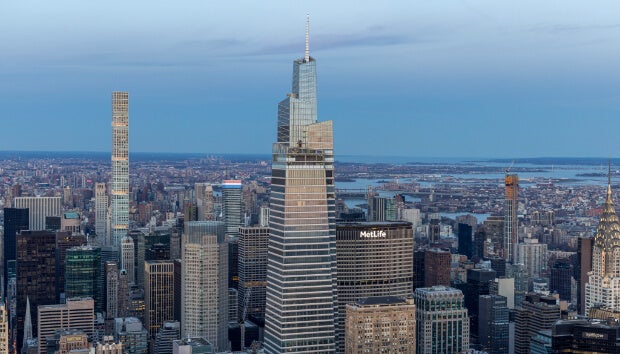A view of the NYC skyline with the SUMMIT One Vanderbilt skyscraper centered, surrounded by other tall buildings.